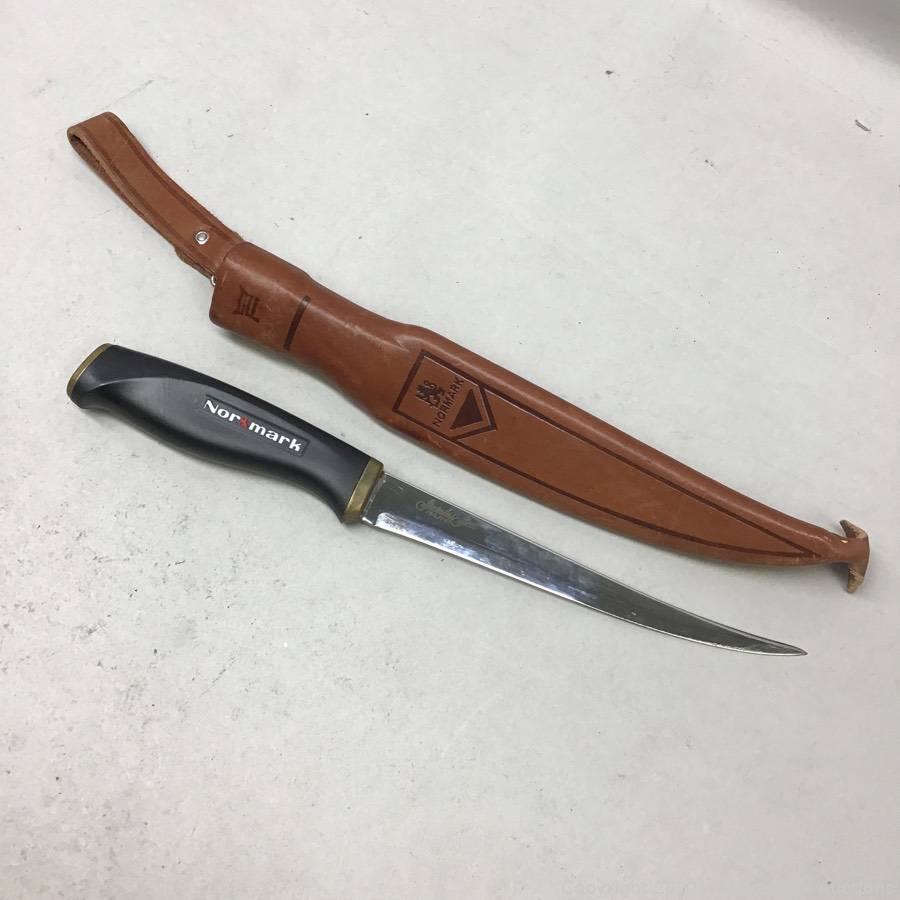 Normark fillet knife with leather sheath Auction